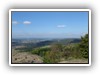 Aussicht vom Staffelberg, gegenber im Wald die Wallfahrtskirche Vierzehnheiligen.